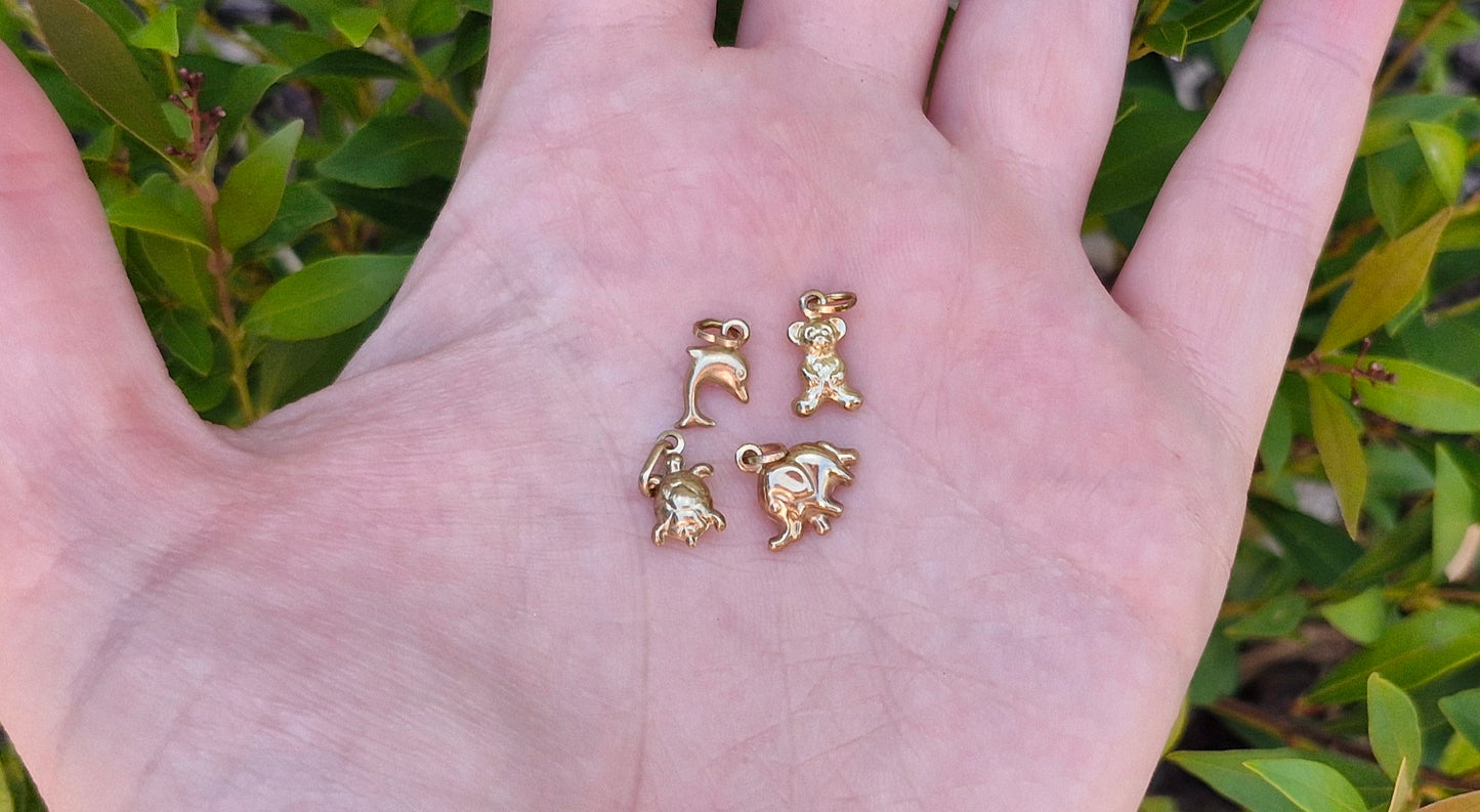 A Collection of 9ct Gold Charms