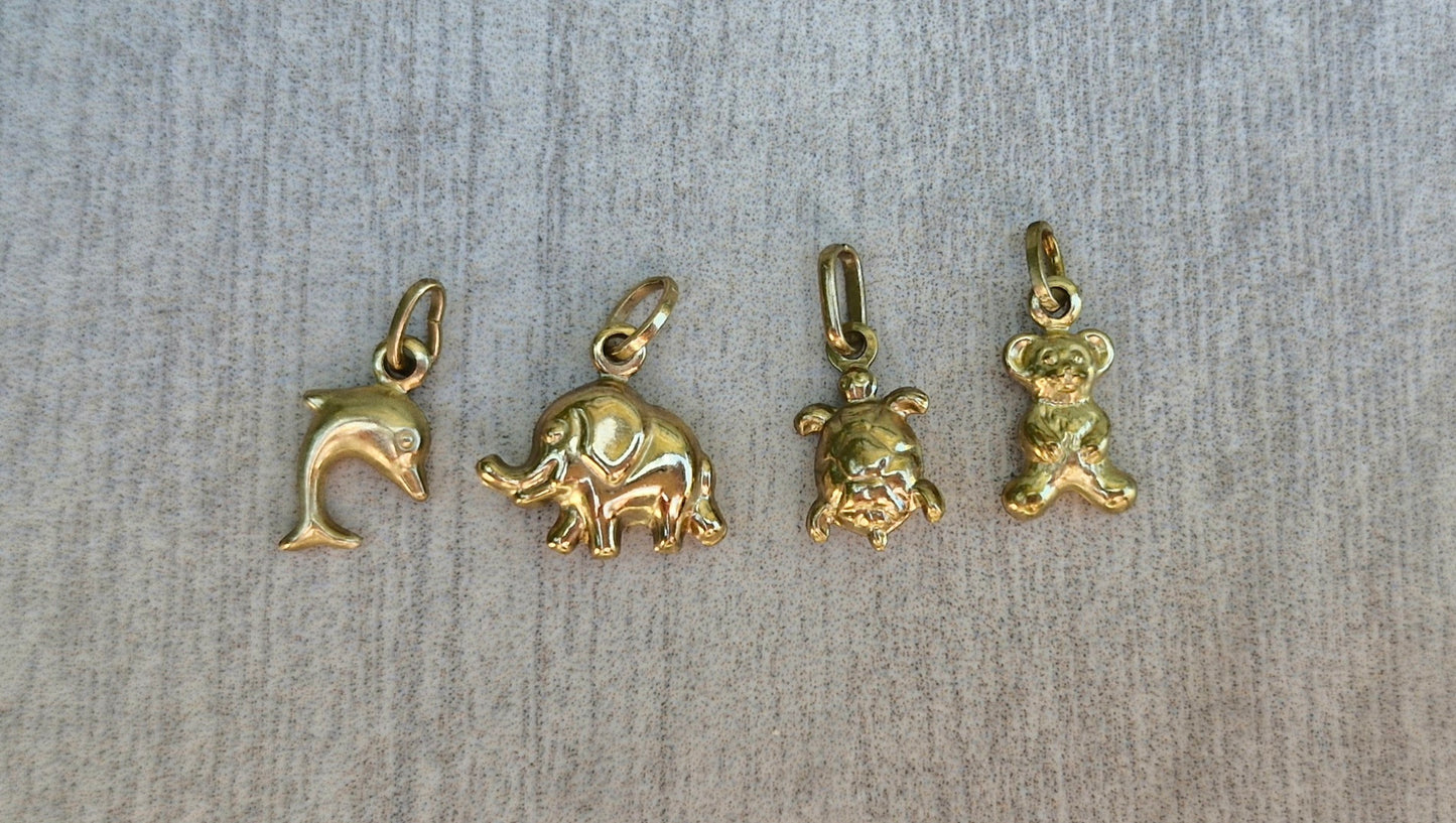 A Collection of 9ct Gold Charms