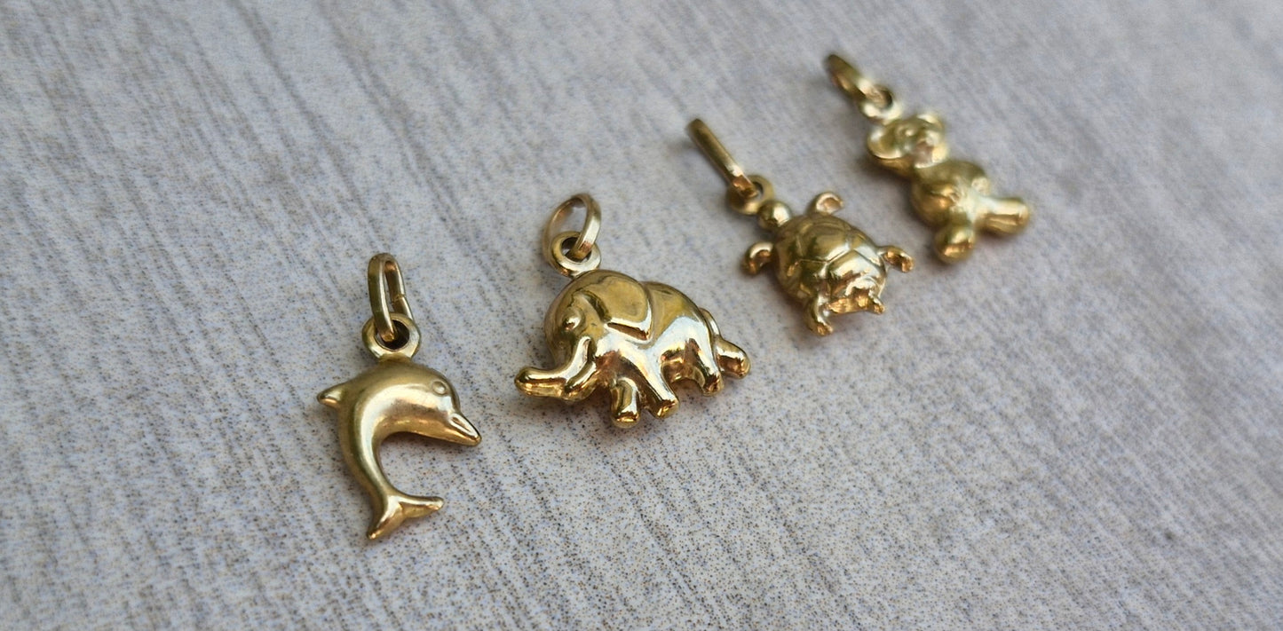 A Collection of 9ct Gold Charms