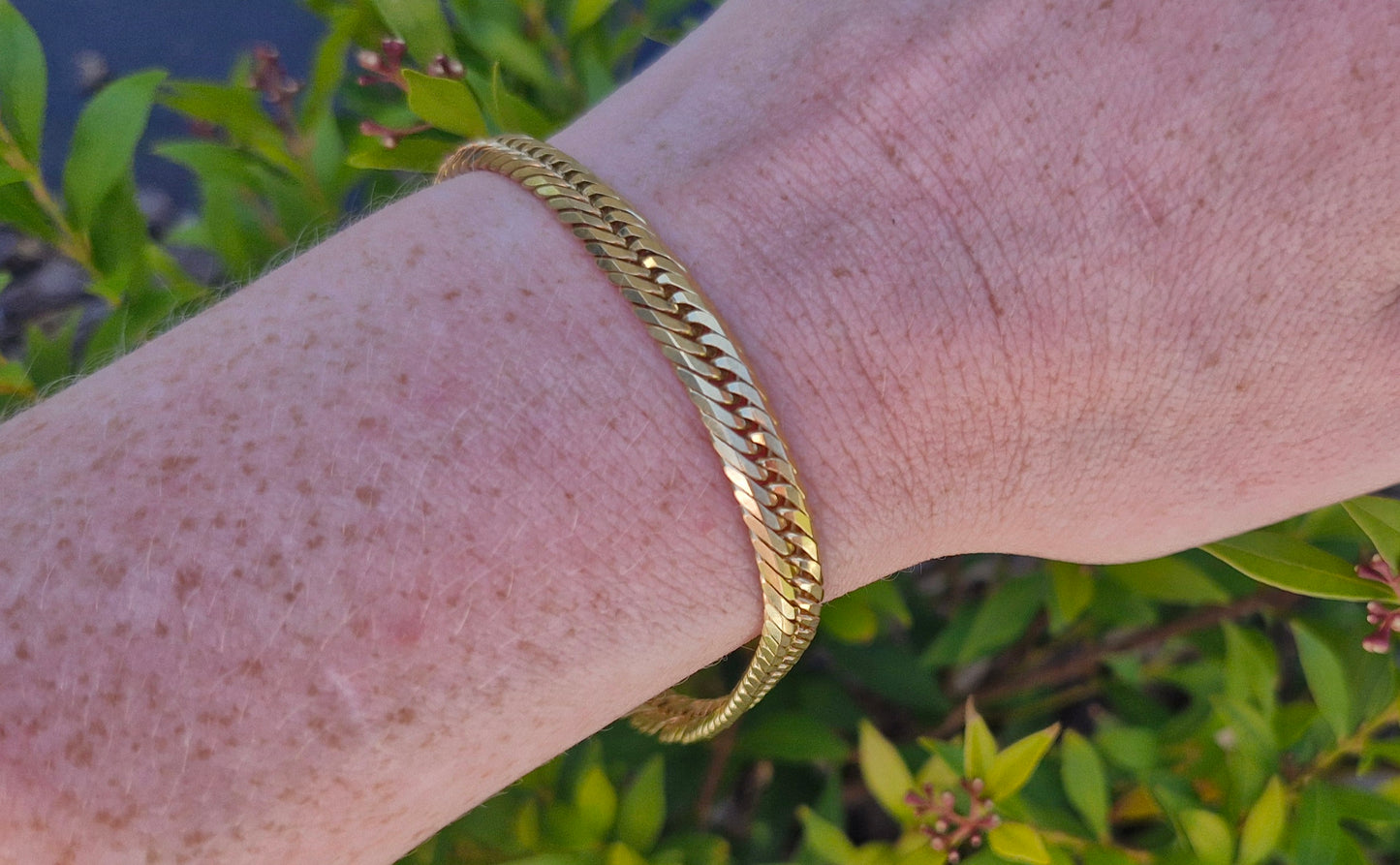 VAL $11,100 - 18ct Solid Yellow Gold Bracelet